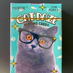 Cat playing cards